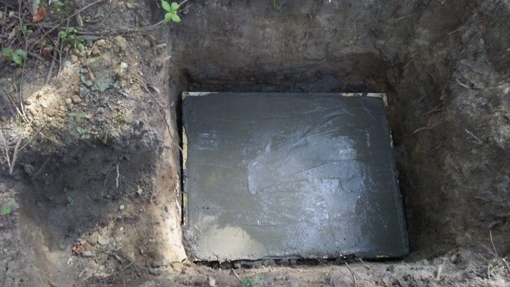 Hole and Concrete Pad for Concrete Cache